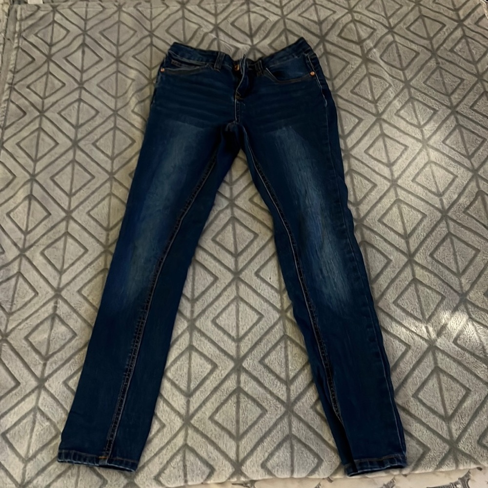 The color is blue.. Used but not noticeable